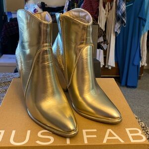 Golden snakeskin booties